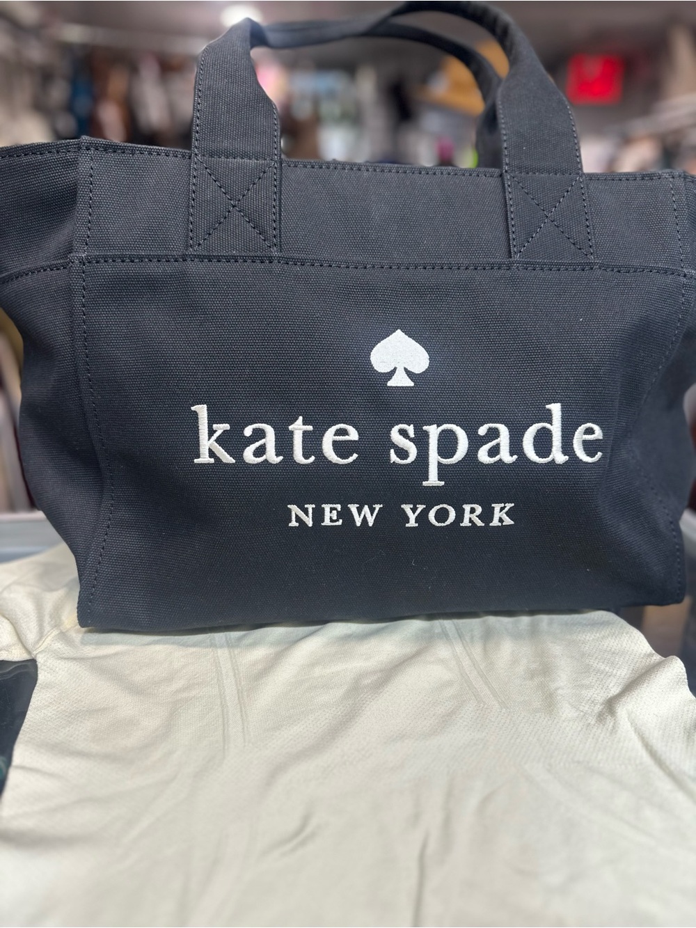 kate spade black canvas tote with white logo . New no tag
